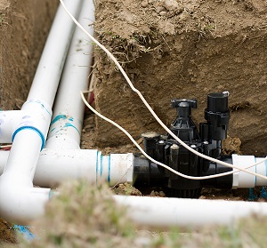 Installation of a sprinkler irrigation system.