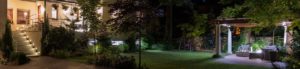 Backyard patio lighting at night.