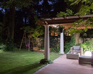 Lawn and patio at night.