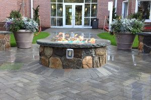Fire pit outside of building.